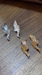 Brinco de ondas e detalhes